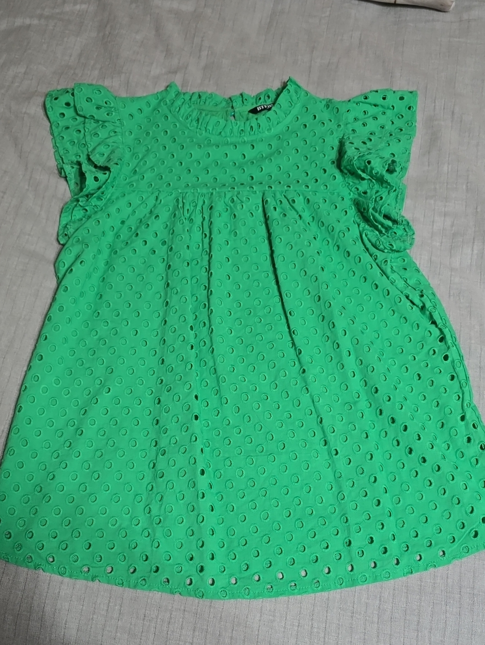 Woman's Green Eyelet Flutter-Sleeve Top